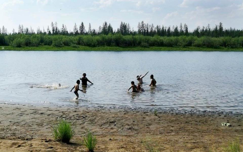Children play in the Krugloe lake outside Verkhoyansk -  Olga Burtseva