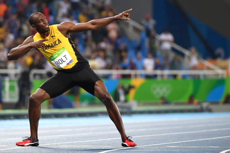 Usain Bolt strikes his 'Lightning Bolt' after winning the 200m at the 2016 Rio Olympics (OLIVIER MORIN)