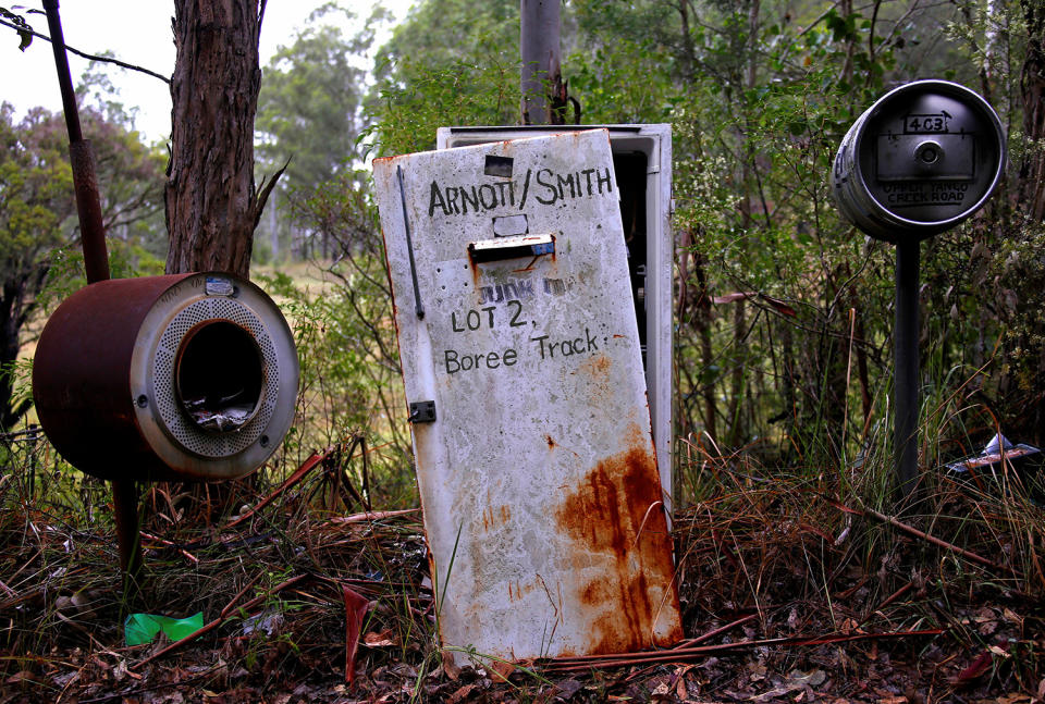 <p>An old refrigerator, an old washing machine, and a beer keg serve as mailboxes in the outskirts of Wollombi township, north of Sydney, Australia. (Photo: David Gray/Reuters) </p>