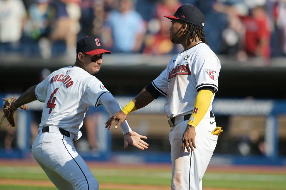 Sep 15, 2024; Cleveland, Ohio, USA; Cleveland Guardians shortstop Brayan Rocchio (4) and designated hitter Jose Ramirez (11) celebrate after the Guardians beat the Tampa Bay Rays at Progressive Field. Mandatory Credit: Ken Blaze-Imagn Images