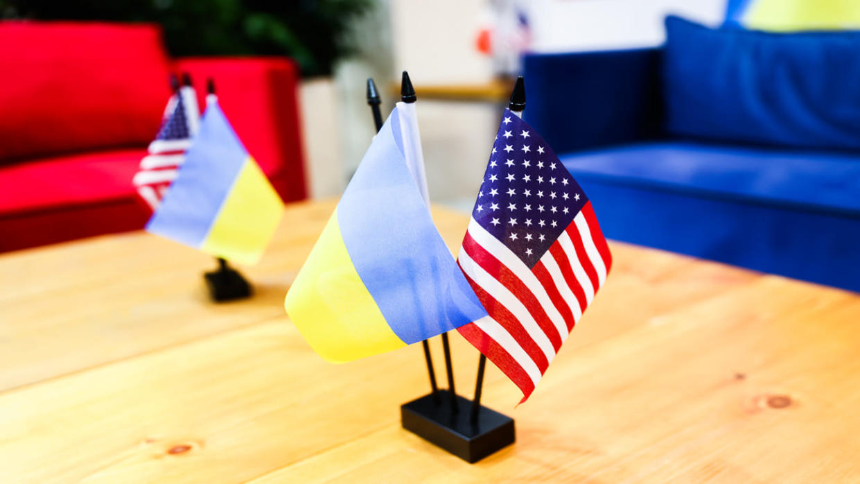 The national flags of Ukraine and the United States.