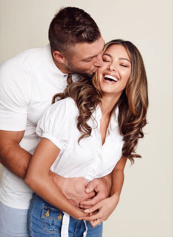 <p>John Hillin</p> Tim and Demi-Leigh Tebow