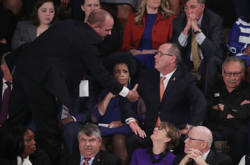 Fred Guttenberg, father of Parkland school shooting victim Jaime Guttenberg, is ejected after shouting during U.S. President Donald Trump's State of the Union address