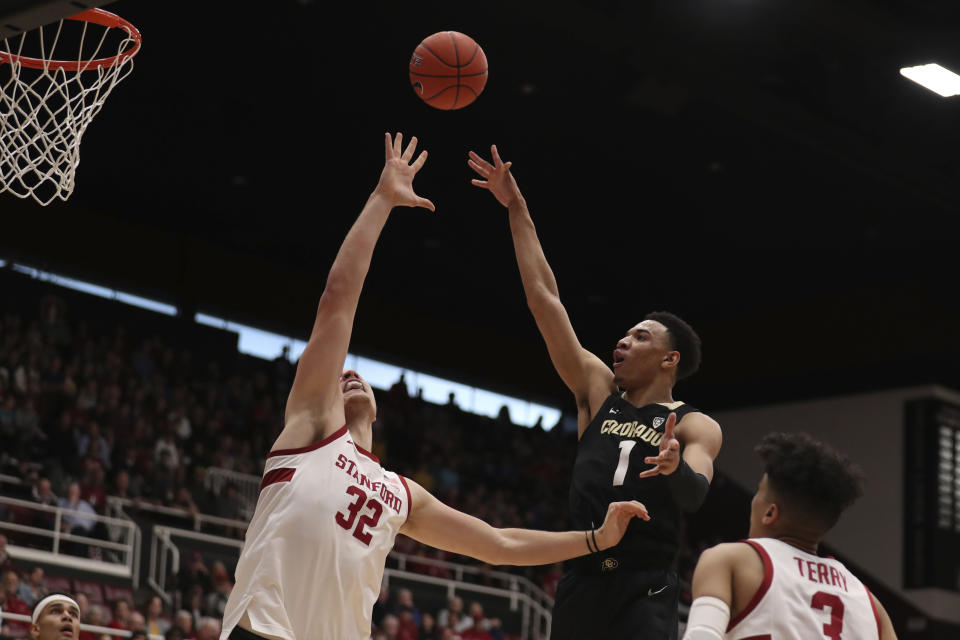 Colorado forward Tyler Bey (1) shoots against Stanford forward Lukas Kisunas (32) during the first half of an NCAA college basketball game in Stanford, Calif., Sunday, March 1, 2020. (AP Photo/Jed Jacobsohn)