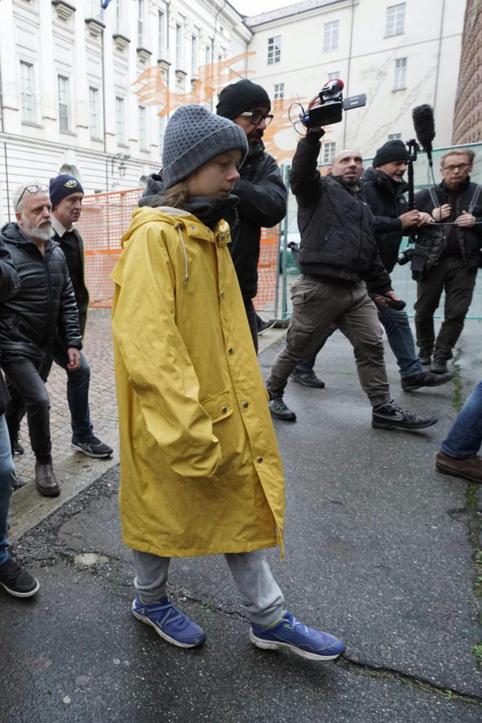 Swedish environmental activist Greta Thunberg walks in Piazza Castello Square ahead of a climate march, in Turin, Italy, Friday. Dec. 13, 2019. Thunberg was named this week Time's Person of the Year, despite becoming the figurehead of a global youth movement pressing governments for faster action on climate change. (Tino Romano/ANSA via AP)