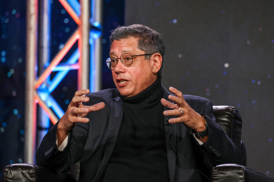 Dean Devlin speaks onstage during 