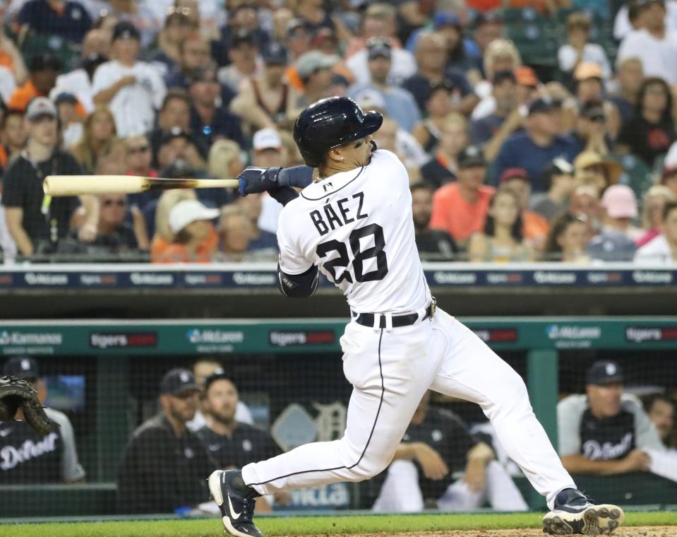 Tigers shortstop Javier Baez doubles against Tampa Bay Rays reliever Jimmy Yacoabonis (not pictured) during the seventh inning Aug. 6, 2022 at Comerica Park.