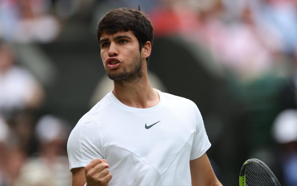 Carlos Alcaraz celebrates holding serve