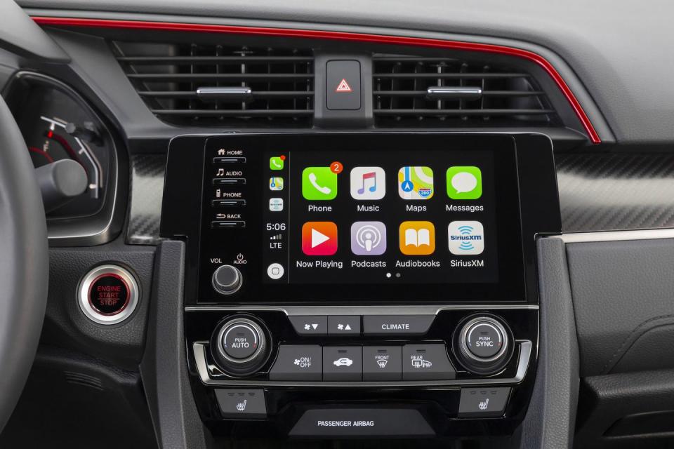 <p>To round out the changes to the interior, Honda improved its Apple CarPlay and Android Auto user experience. A carry-over from the 2019 Civic Si are the physical volume knob and row of buttons, which we can't get enough of. The only thing it's missing now is a physical tuning knob . . . </p>
