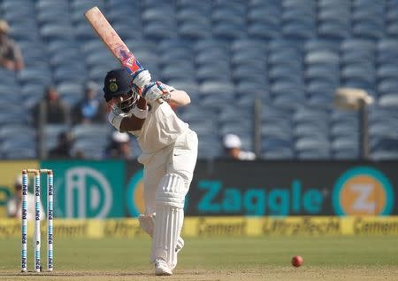 Cricket - India v Australia - First Test cricket match - Maharashtra Cricket Association Stadium, Pune, India - 24/02/17. India's Lokesh Rahul plays a shot. REUTERS/Danish Siddiqui