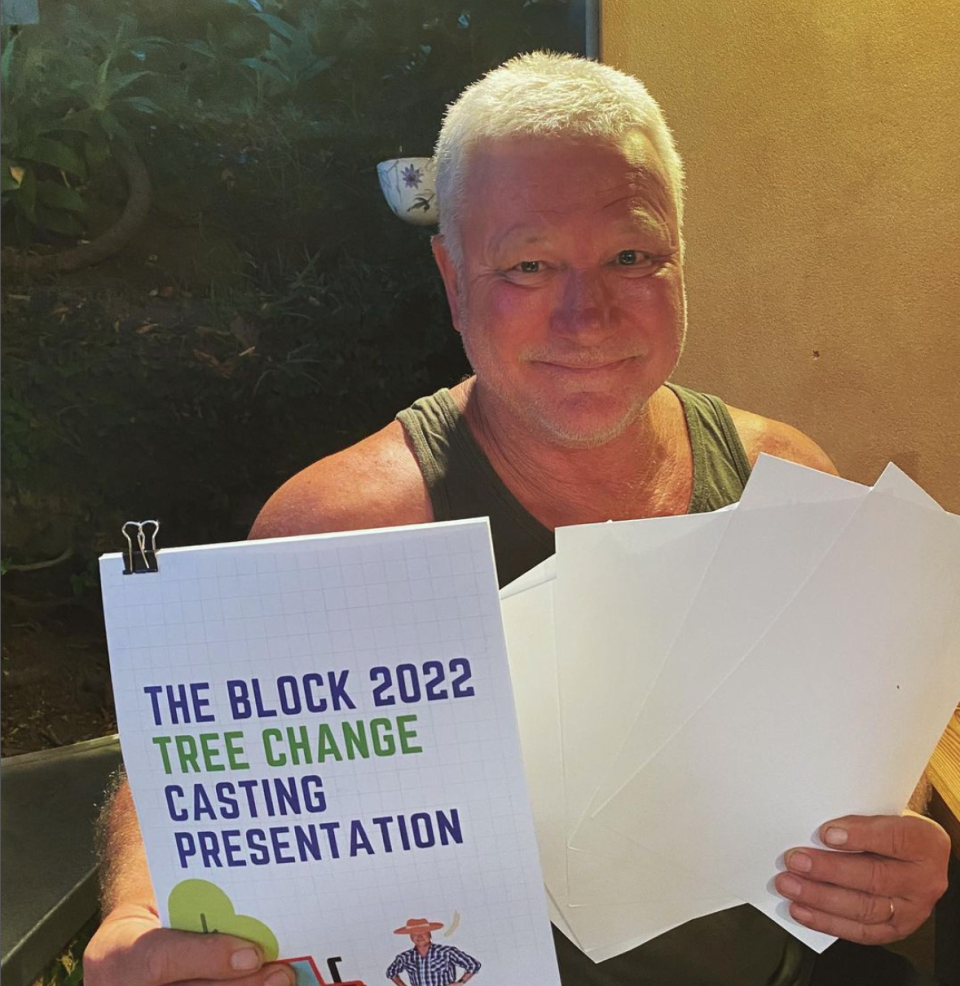 Scotty Cam holding up the block 2022 casting papers