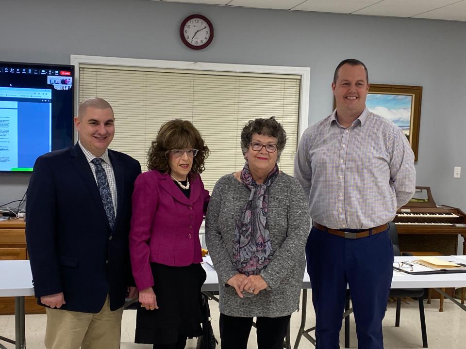 From left to right: Selectman Joe Pacheco; Selectman Patricia Riley; Kathleen Voller; and Selectman Kenneth Collins. Voller received February 2024 Raynham Recognition Award from the Town of Raynham. Photo taken February 27, 2024 at the Raynham Senior Center.