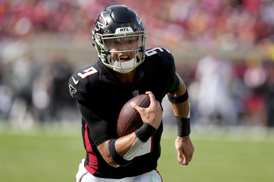 Atlanta Falcons quarterback Desmond Ridder (9) runs against the Tampa Bay Buccaneers during the second half of an NFL football game, Sunday, Oct. 22, 2023, in Tampa, Fla. (AP Photo/Chris O'Meara)