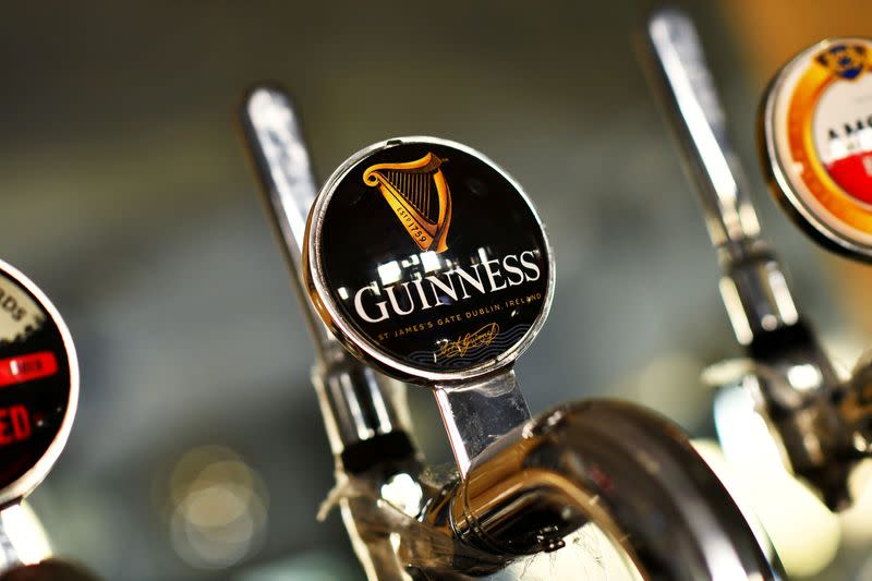 FILE PHOTO: A Guinness beer tap is seen inside The Greenwich Pensioner pub in London