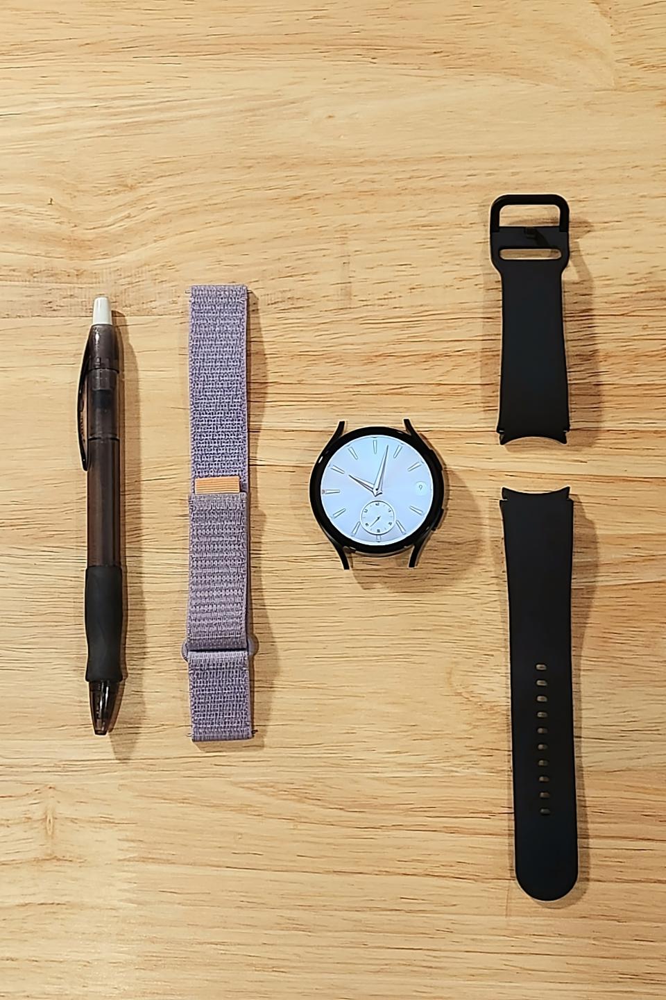 Watch6 face laid next to fabric and sports bands