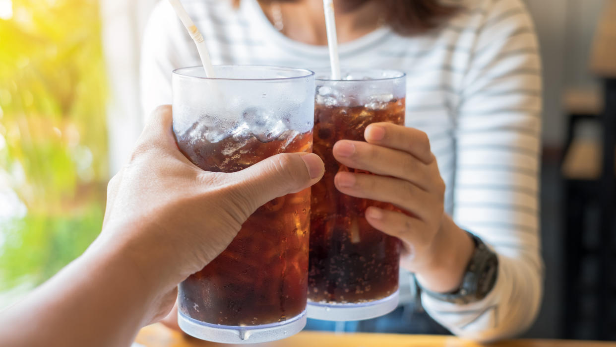 couple drinking soda