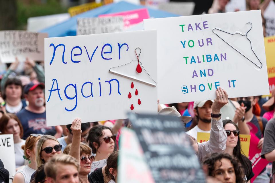 Abortion rights activists rally during a Bans Off Our Bodies protest at U-M's Diag in Ann Arbor on Saturday, May 14, 2022.