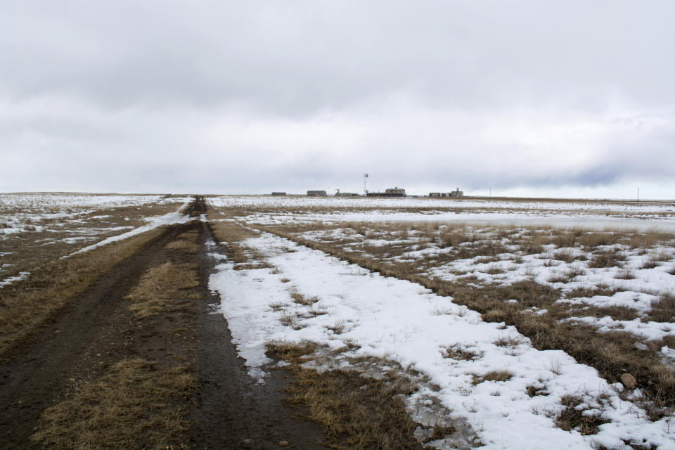 This March 11, 2020 photo provided by the Bureau of Land Management shows the proposed route of the Keystone XL oil pipeline where it crosses into the U.S. from Canada in Phillips County, Montana. A Canadian company said Monday, April 6, 2020, that it's started construction on the long-stalled Keystone XL oil sands pipeline across the U.S.-Canada border, despite calls from tribal leaders and environmentalists to delay the $8 billion project amid the coronavirus pandemic. (Al Nash/Bureau of Land Management via AP)