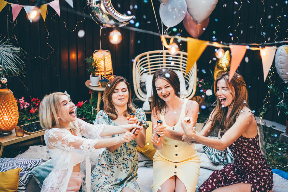 a group of women at a backyard party