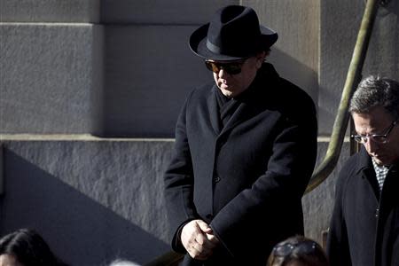 Actor John C. Reilly leaves actor Philip Seymour Hoffman's funeral at St. Ignatius church in the Manhattan borough of New York February 7, 2014. REUTERS/Carlo Allegri