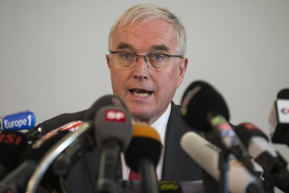 Pat McQuaid, President of the Union Cycliste Internationale, UCI, informs about the position of the UCI regarding the decision from USADA in the case of Lance Armstrong, during a press conference in Geneva, Switzerland, on Monday, Oct. 22, 2012. Cycling's governing body has agreed to strip Lance Armstrong of his seven Tour de France titles and ban him for life. McQuaid announced that the federation accepted the U.S. Anti-Doping Agency's report on Armstrong and would not appeal to the Court of Arbitration for Sport. (AP Photo/Keystone, Salvatore Di Nolfi)