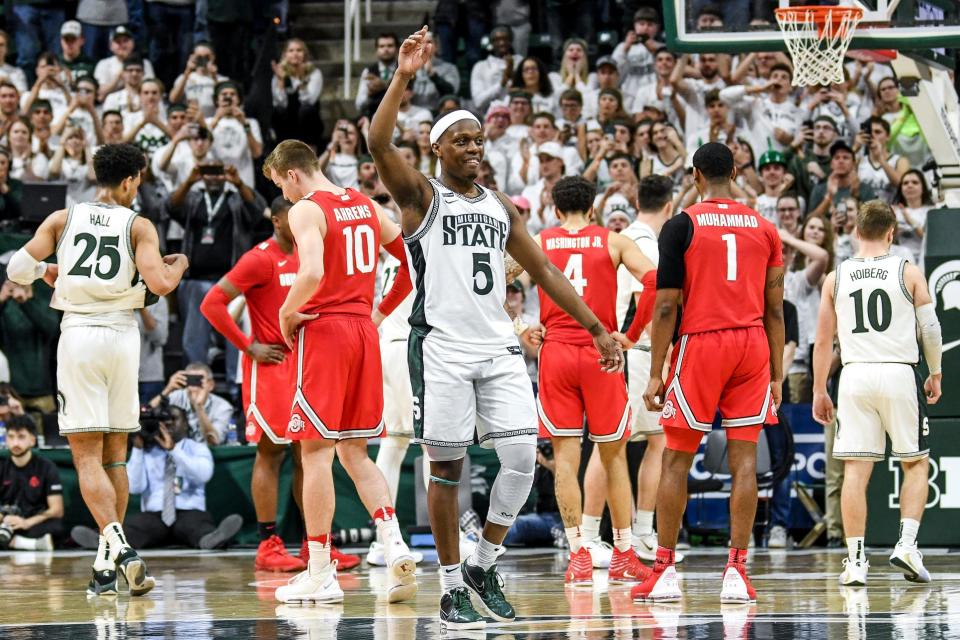 Michigan State's Cassius Winston waves to fans before checking out of the game against Ohio State during the second half on Sunday, March 8, 2020, at the Breslin Center in East Lansing. It was his last college game.
