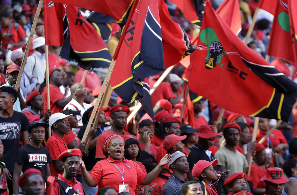 Supporters of the Economic Freedom Fighters (EFF) party, attend their election rally at Orlando Stadium in Soweto, South Africa, Sunday, May 5, 2019. Campaign rallies for South Africa’s upcoming election have reached a climax Sunday with mass rallies by the ruling party and one of its most potent challengers. (AP Photo/Themba Hadebe)