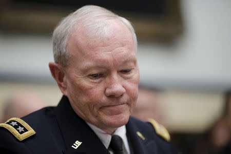 U.S. Joint Chiefs Chairman General Martin Dempsey arrives to testify before a House Armed Services Committee hearing on U.S. Policy and Strategy in the Middle East, on Capitol Hill in Washington June 17, 2015. REUTERS/Carlos Barria