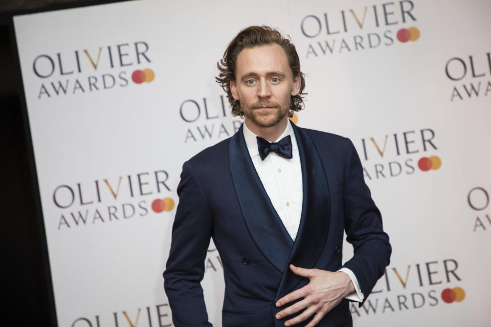 Actor Tom Hiddleston poses for photographers backstage at the Olivier Awards in London, Sunday, April 7, 2019. (Photo by Vianney Le Caer/Invision/AP)