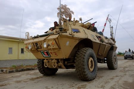 Afghan army troops in a Mobile Strike Force Vehicle (MSFV) return from a mission in Kunduz, Afghanistan April 21, 2016. REUTERS/Josh Smith