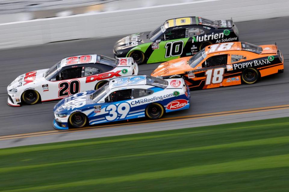 Harrison Burton, driver of the #20 DEX Imaging Toyota, Ryan Sieg, driver of the #39 CMR Construction and Roofing Ford, Daniel Hemric, driver of the #18 Poppy Bank Toyota, Jeb Burton, driver of the #10 Nutrien Ag Solutions Chevrolet, race during the NASCAR Xfinity Series Beef. It’s What’s For Dinner. 300 at Daytona International Speedway on February 13, 2021 in Daytona Beach, Fla.