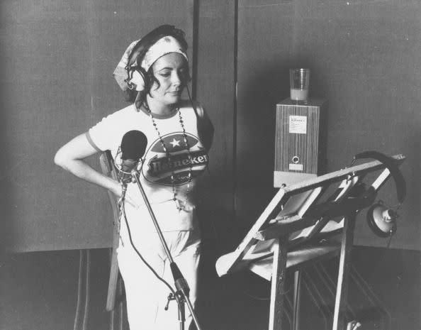 <p>This candid shot of Elizabeth shows her working in a recording studio in California in 1970, however it's unclear what she was working on. </p>