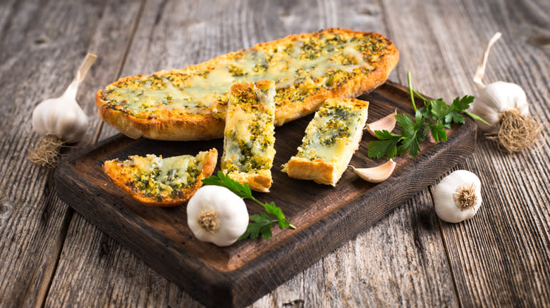 fresh garlic bread with cheese and spices