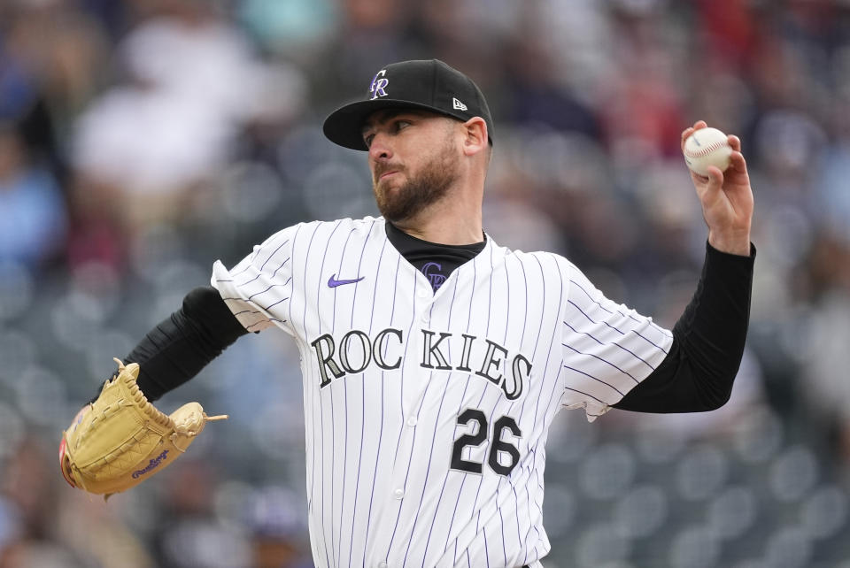 Colorado Rockies starting pitcher Austin Gomber works against the Texas Rangers during the first inning of a baseball game Friday, May 10, 2024, in Denver. (AP Photo/David Zalubowski)