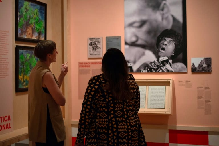 Sarah Seidman (L) and Zinga Fraser are co-curators of the 'Changing the Face of Democracy: Shirley Chisholm at 100' exhibition in New York (Elza GOFFAUX)