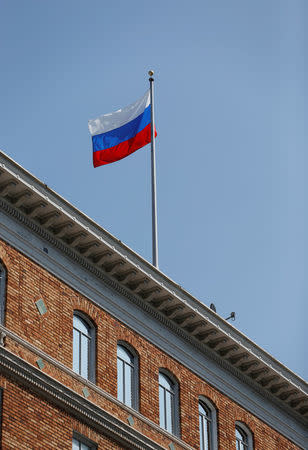 The Russian flag waves in the wind on the rooftop of the Consulate General of Russia in San Francisco, California, U.S., August 31, 2017. REUTERS/Stephen Lam
