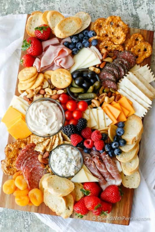 <p>Spend With Pennies</p><p>Grazing at a party only adds to the fun.</p><p><strong>Get the recipe: <a href="https://www.spendwithpennies.com/how-to-make-a-charcuterie-board/" rel="nofollow noopener" target="_blank" data-ylk="slk:Charcuterie Board;elm:context_link;itc:0;sec:content-canvas" class="link rapid-noclick-resp">Charcuterie Board</a></strong></p>
