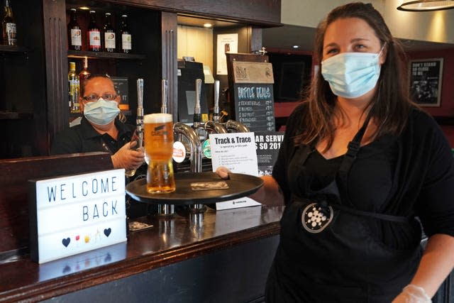 Pub staff wearing PPE