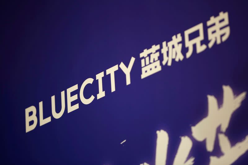 Sign of BlueCity Holdings Ltd, the owner of China's biggest dating app for gay men, is seen ahead of the company's debut on Nasdaq, in Beijing