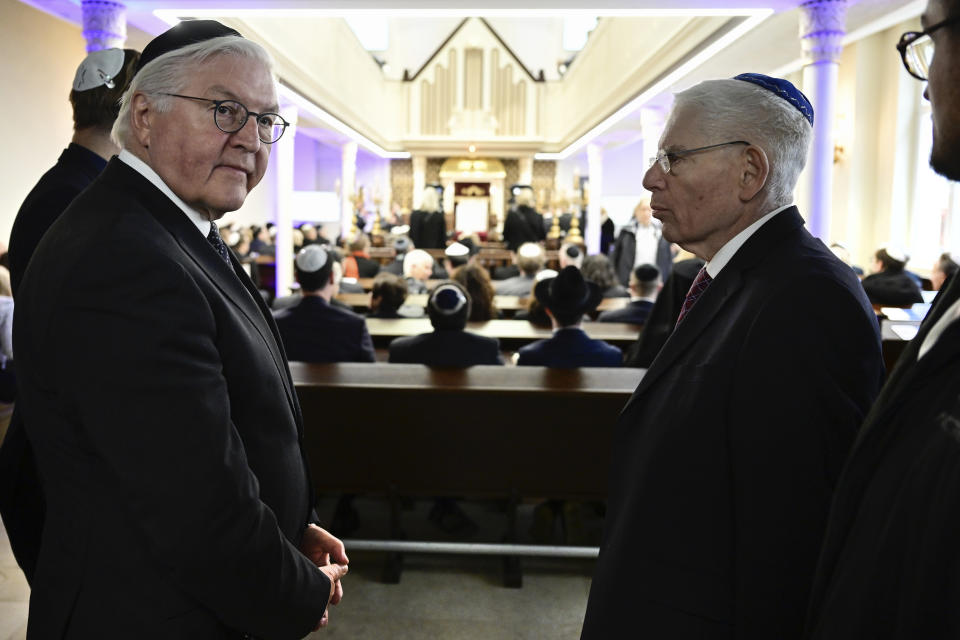 German President Frank-Walter Steinmeier, left, and the President of the Central Council of Jews in Germany Josef Schuster arrive to attend a central commemoration ceremony for the 85th anniversary of the Night of Broken Glass (Kristallnacht) will take place in Berlin, Thursday, Nov. 9, 2023 in Berlin. (John MacDougall, Pool via AP)