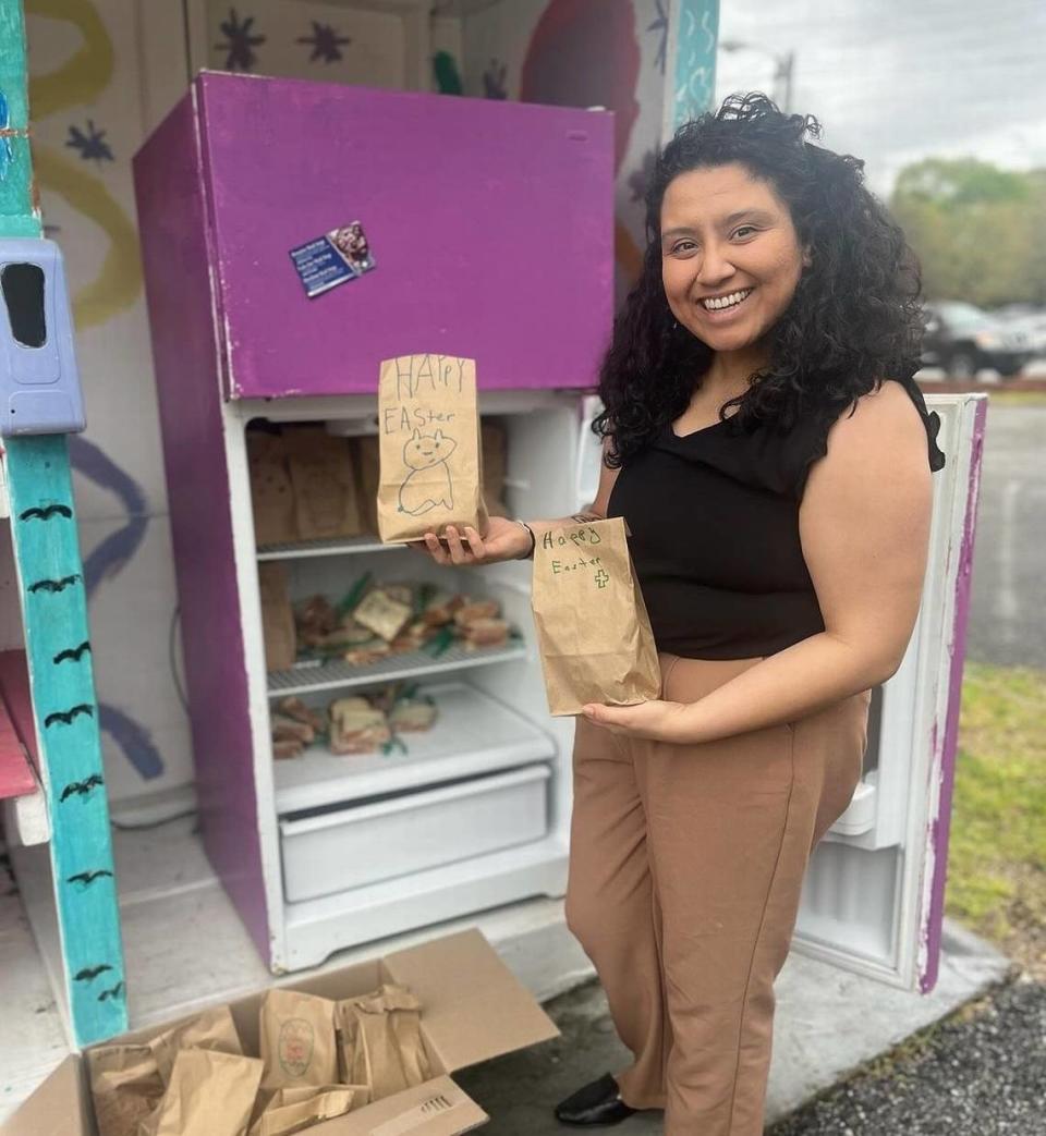 A volunteer recently stocked the Macon Community Fridge with meals for the Easter holiday.