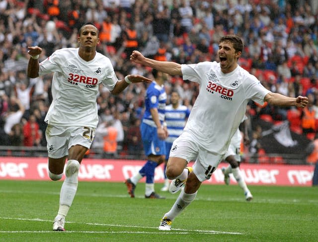 Scott Sinclair (left) scored a hat-trick in Swansea's 4-2 Championship play-off final victory against Reading