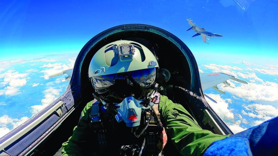A Chinese fighter pilot takes part in military drills around Taiwan on April 9, 2023. Beijing considers the island nation a rogue province and has threatened to take it back by force. (Mei Shaoquan/Xinhua via AP)