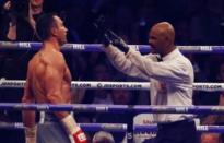 Britain Boxing - Anthony Joshua v Wladimir Klitschko IBF, IBO & WBA Super World Heavyweight Title's - Wembley Stadium, London, England - 29/4/17 Wladimir Klitschko receives a count by the referee after being knocked down by Anthony Joshua Action Images via Reuters / Peter Cziborra Livepic