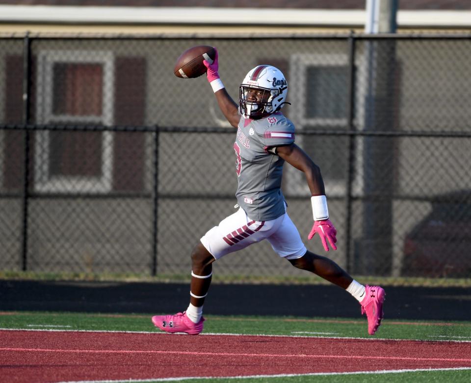 Snow Hill's Zyheem Collick (8) scores a touchdown against Nandua Friday, Sept. 8, 2023, at Kelly Shumate Stadium in Snow Hill, Maryland. Snow Hill defeated Nandua 26-23.