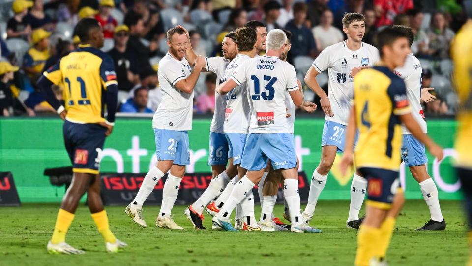 Celebrating Sydney FC players.