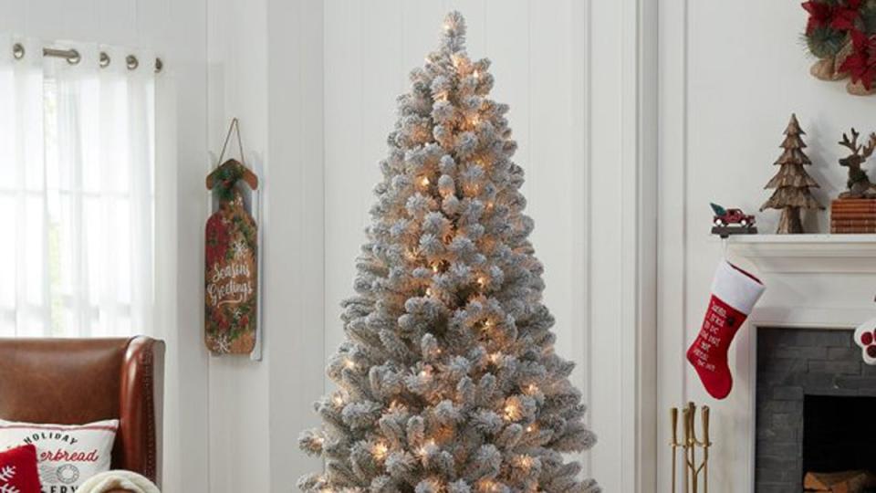 Make the holiday spirit stand out in your home with this Holiday Time Christmas tree.