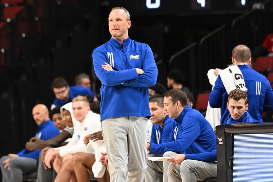 Drake Bulldogs head coach Darian DeVries watches action against the Mississippi State Bulldogs.