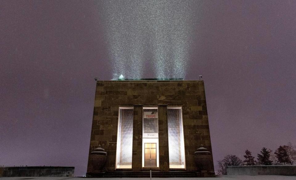Snow falls at the World War I Museum and Memorial on Saturday, Nov. 25, 2023, in Kansas City.