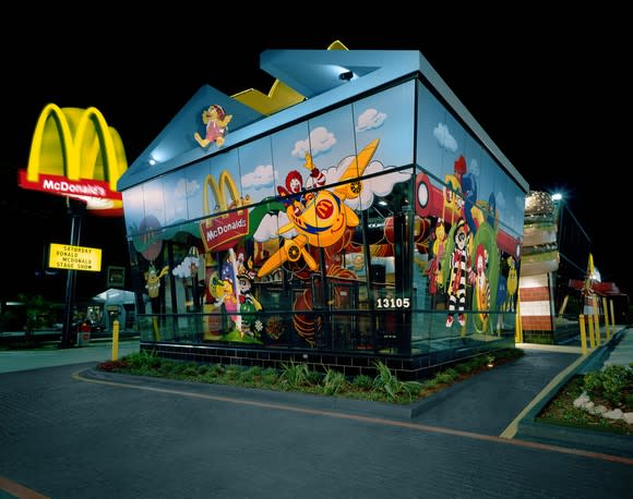 Exterior view of McDonald's Dallas location at night.